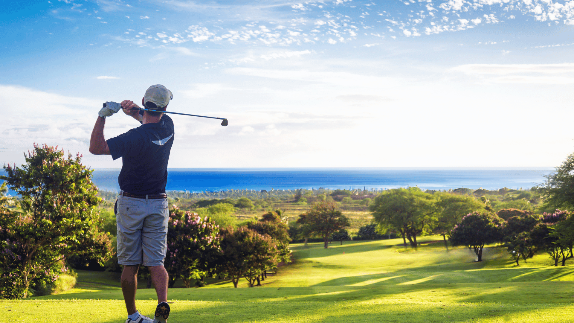 man playing golf views